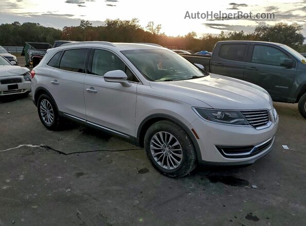2LMPJ6KR5HBL14652 2017 LINCOLN MKX Белый Передняя правая четверть