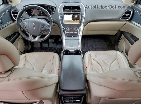2LMPJ6LR5HBL34477 2017 LINCOLN MKX Tan Widok deski rozdzielczej