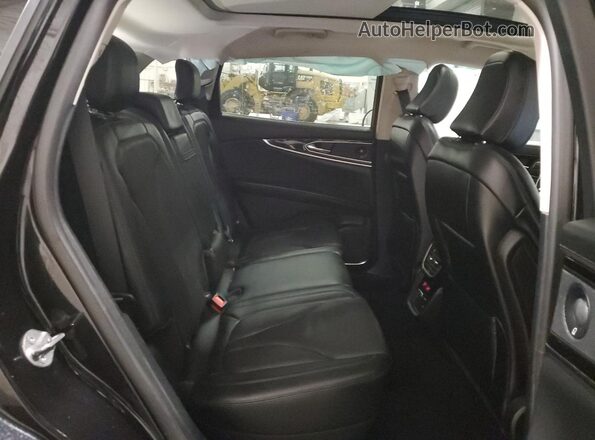 2LMPJ8K92PBL25926 2023 LINCOLN NAUTILUS Black Vista interior trasera