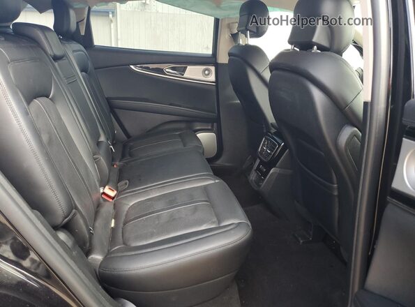 2LMPJ8KP4MBL00567 2021 LINCOLN NAUTILUS Black Widok wnętrza z tyłu