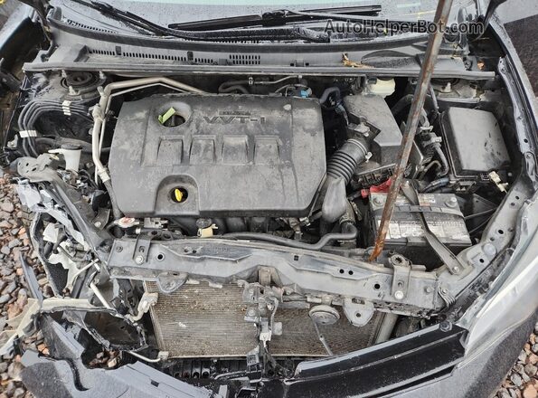 2T1BURHEXHC943452 2017 TOYOTA COROLLA Black Vista interior trasera