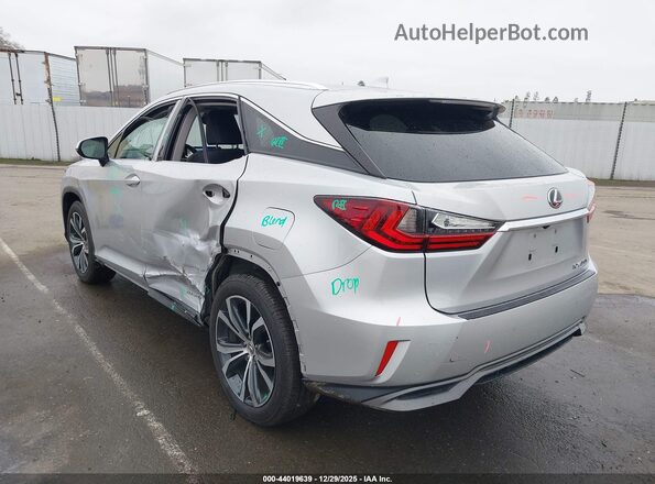2T2BGMCA4GC001910 2016 LEXUS RX 450H Серебряный Задняя левая четверть