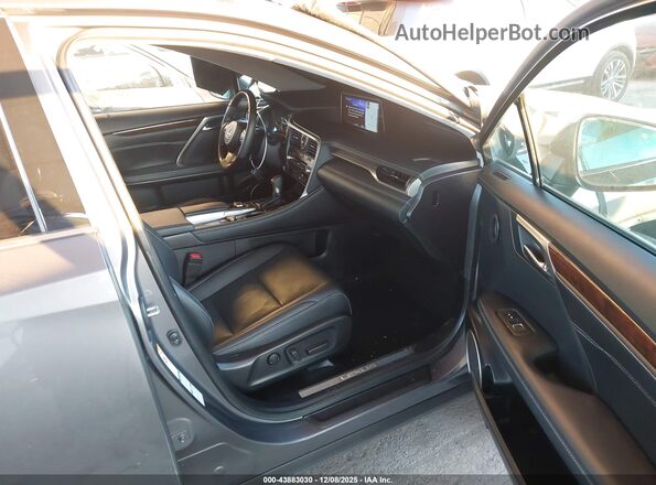2T2BGMCAXKC033477 2019 LEXUS RX 450H Gray Vista interior delantera
