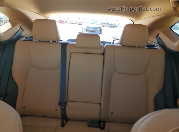 2T2GDCAZ7SC027508 2025 LEXUS NX White Vista de los asientos traseros