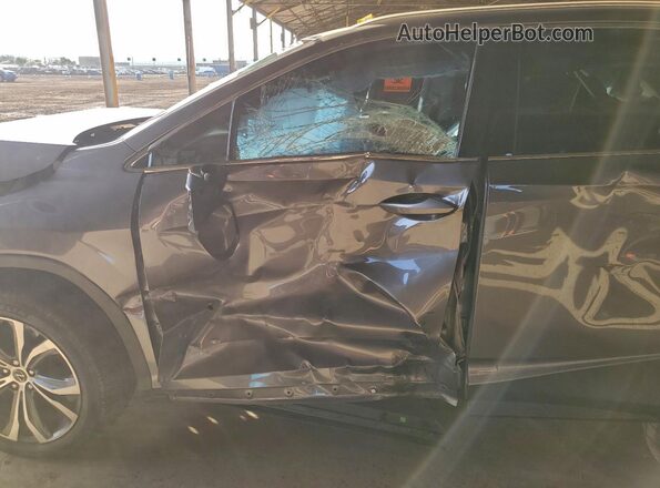2T2HZMAA0MC196259 2021 LEXUS RX Gray Vista interior delantera