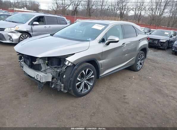 2T2HZMDA7LC226626 2020 LEXUS RX 350 Серебряный Передняя левая четверть