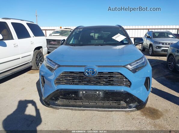 2T3E6RFV5RW080464 2024 TOYOTA RAV4 HYBRID Blue Սարքավորումների վահանակի տեսք