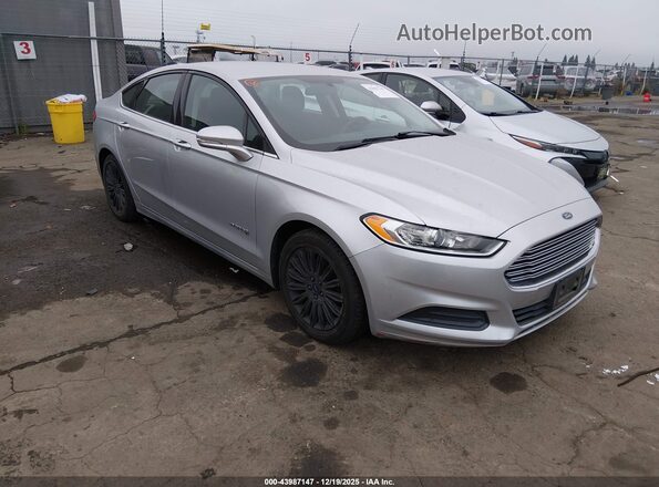 3FA6P0LU1GR291323 2016 FORD FUSION HYBRID Серебряный Передняя правая четверть