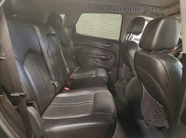 3GYFNCE36GS532818 2016 CADILLAC SRX Черный Вид задней части салона