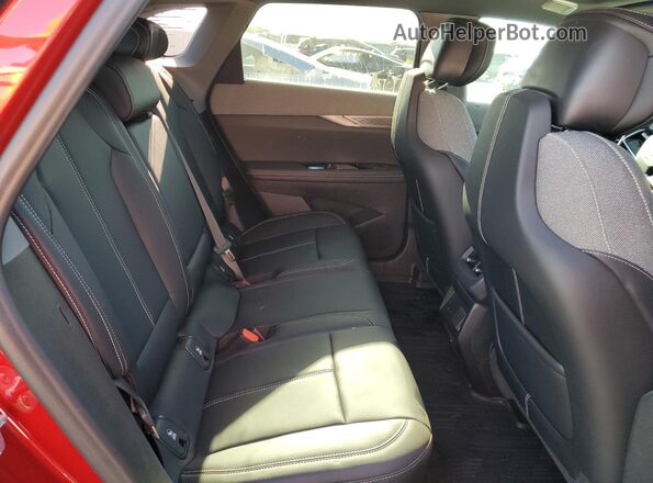 3GYK3EMR8SS248511 2025 CADILLAC OPTIQ Red Widok wnętrza z tyłu