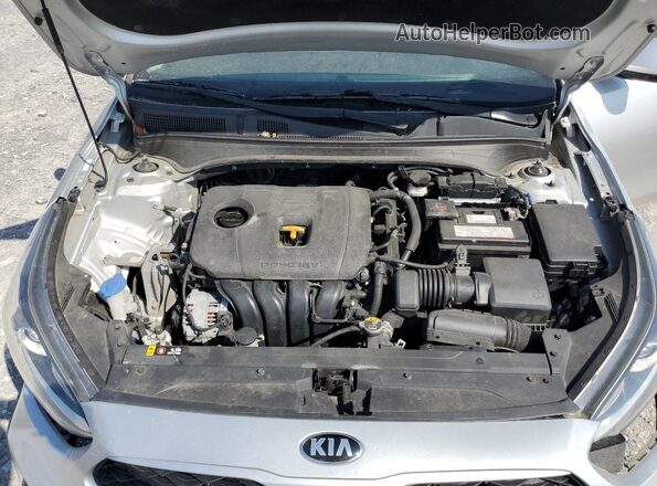 3KPF24AD7KE013383 2019 KIA FORTE Серебряный Вид задней части салона