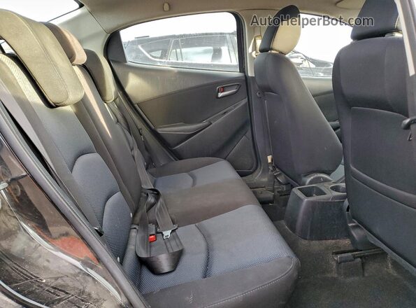 3MYDLBYV9HY180697 2017 TOYOTA YARIS Black Rear seats view