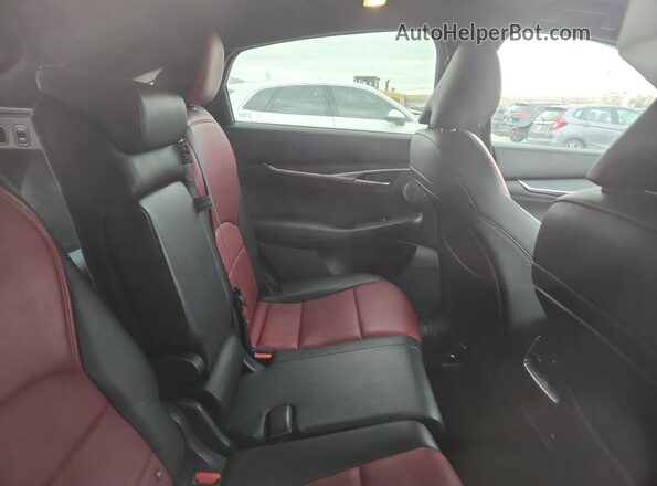 3PCAJ5LR3PF101554 2023 INFINITI QX55 Red Vista de los asientos traseros
