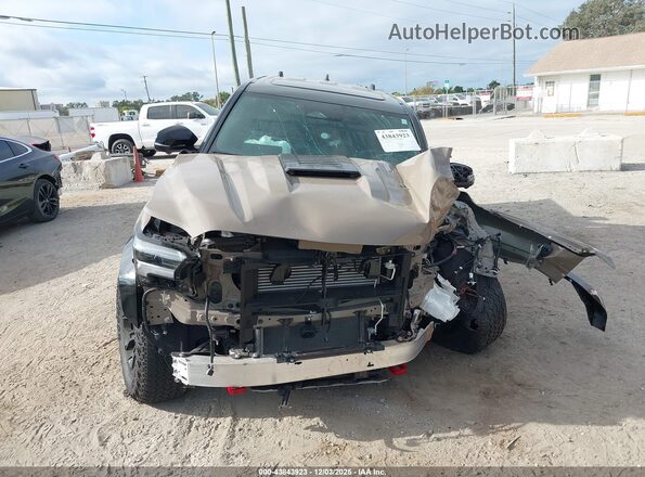 3TYLC5LNXST018633 2025 TOYOTA TACOMA HYBRID Brown Vista del cuadro de instrumentos