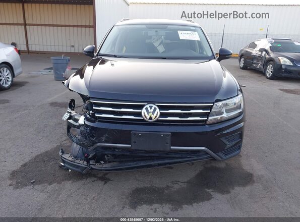 3VV1B7AX5LM053041 2020 VOLKSWAGEN TIGUAN Black Widok wnętrza z tyłu