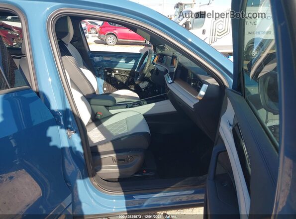 3VVLR7RM8SM059302 2025 VOLKSWAGEN TIGUAN Blue Widok wnętrza z przodu