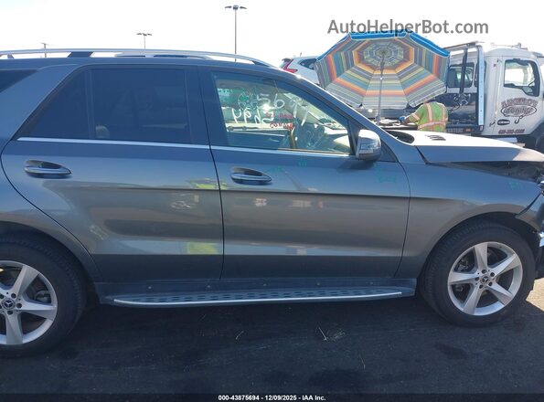 4JGDA5JB7JB132363 2018 MERCEDES-BENZ GLE 350 Silver Widok wnętrza z tyłu