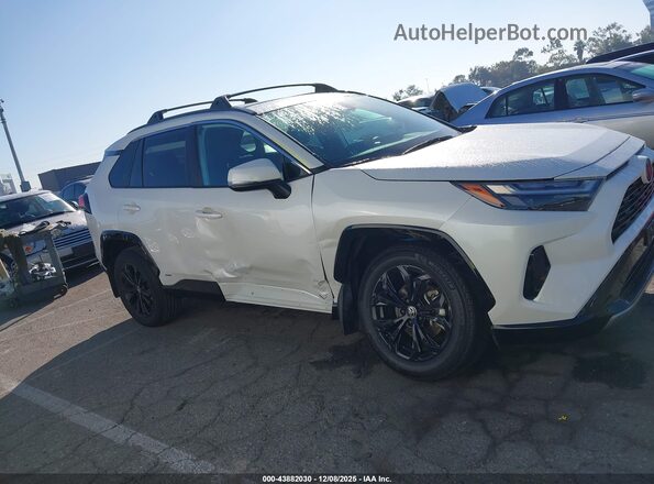 4T3T6RFV9NU071316 2022 TOYOTA RAV4 HYBRID White Вид задньої частини салону