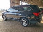 2018 Honda Pilot Touring Черный vin: 5FNYF5H96JB012724