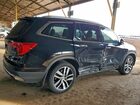 2018 Honda Pilot Touring Черный vin: 5FNYF5H96JB012724
