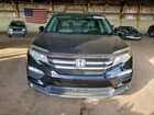 2018 Honda Pilot Touring Черный vin: 5FNYF5H96JB012724