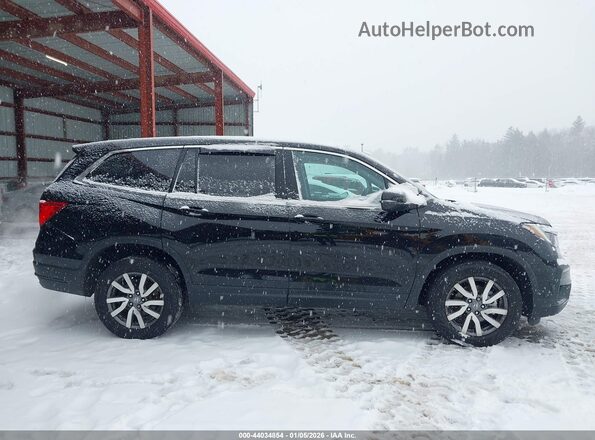 5FNYF6H52KB072763 2019 HONDA PILOT Черный Вид задней части салона