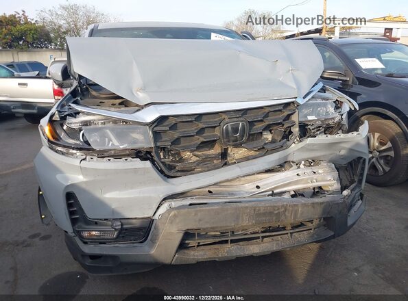 5FNYF8H50PB019286 2023 HONDA PASSPORT Gray Widok z przodu