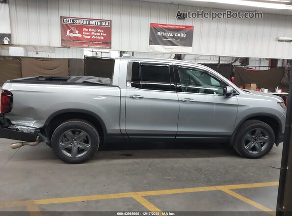 5FPYK3F78PB063496 2023 HONDA RIDGELINE Gray Vista interior trasera