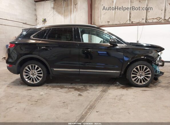 5LMCJ3D91GUJ28540 2016 LINCOLN MKC Black Widok wnętrza z tyłu