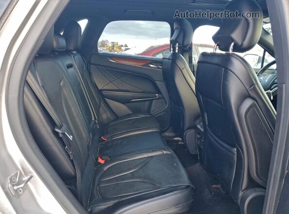 5LMCJ3D95GUJ00174 2016 LINCOLN MKC Серебряный Вид задней части салона