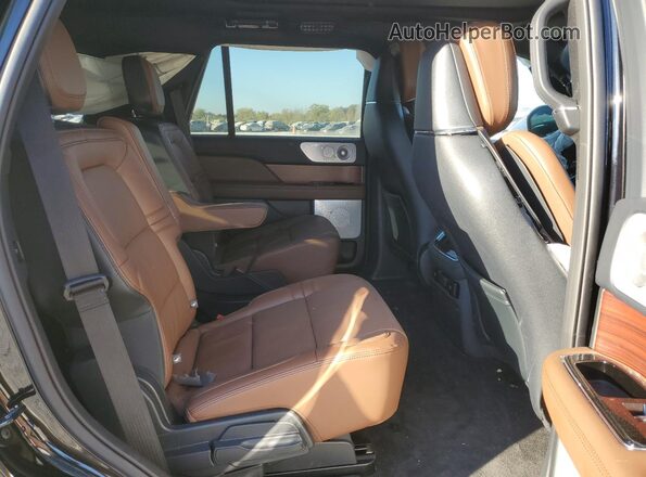 5LMJJ2LG5REL17285 2024 LINCOLN NAVIGATOR Черный Вид задней части салона
