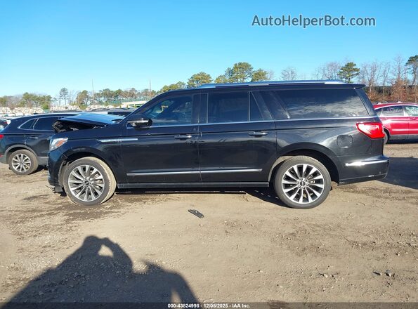 5LMJJ3LT7MEL05098 2021 LINCOLN NAVIGATOR Black Rear interior view