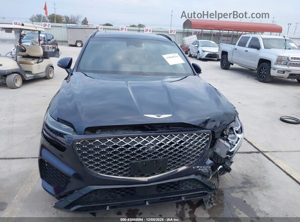 5NMMADTB8RH002515 2024 GENESIS GV70 Dark Blue Вид задней части салона