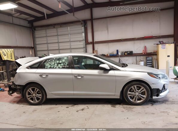5NPE34AF7JH670088 2018 HYUNDAI SONATA Silver Widok wnętrza z tyłu