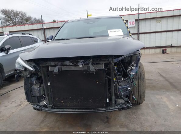 5TDAAAB66SS042505 2025 LEXUS TX 350 Dark Blue Widok wnętrza z tyłu
