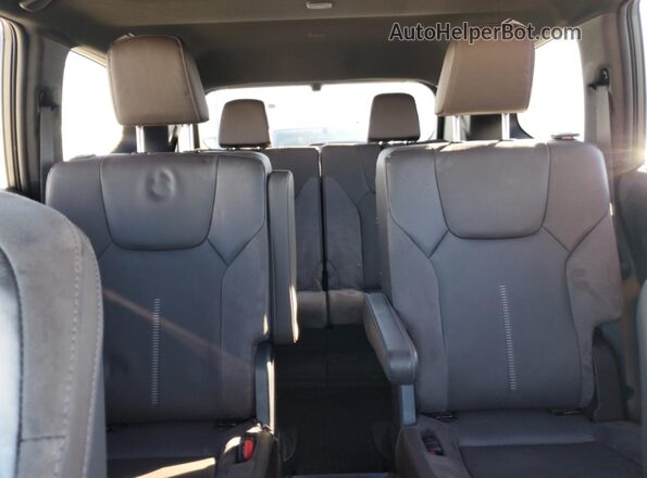 5TDAAAB67SS034154 2025 LEXUS TX White Vista de los asientos traseros