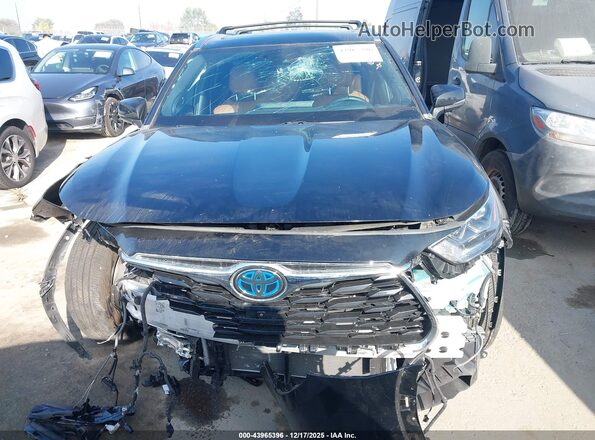 5TDFARAH4PS017410 2023 TOYOTA HIGHLANDER HYBRID Black Rear interior view