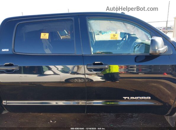 5TFEM5F11KX142651 2019 TOYOTA TUNDRA Black Widok wnętrza z tyłu