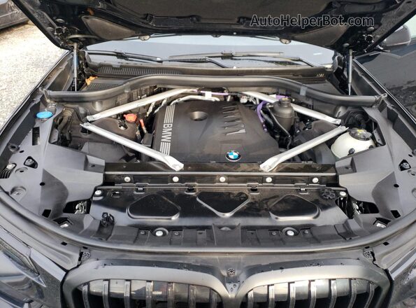 5UX23EM01P9P90503 2023 BMW X7 Black Widok komory silnika