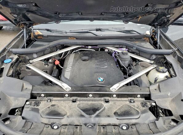 5UX23EM04P9P64302 2023 BMW X7 Black Widok wnętrza z tyłu