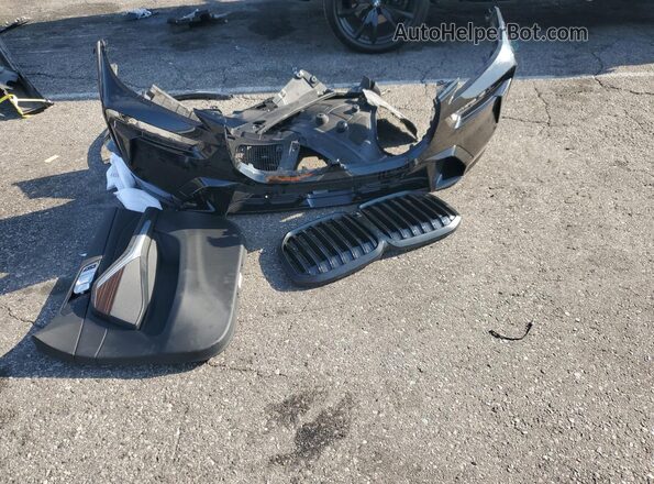 5UX23EM05P9R34957 2023 BMW X7 Black Vista de la etiqueta del VIN