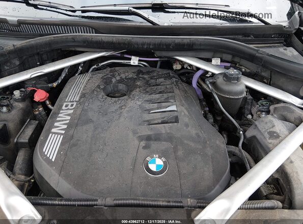 5UX23EM07R9T59490 2024 BMW X7 Black Հետևի տեսք