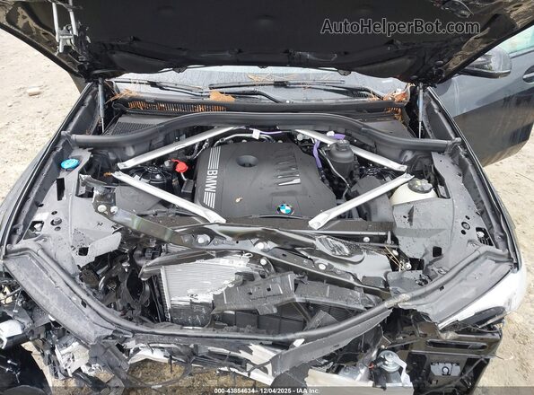 5UX23EU01T9055997 2026 BMW X5 Черный Вид сзади