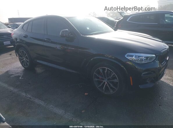 5UX2V1C04M9E74368 2021 BMW X4 Черный Передняя правая четверть