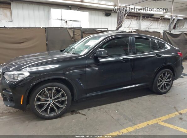 5UX2V1C08L9C45867 2020 BMW X4 Черный Вид задней части салона