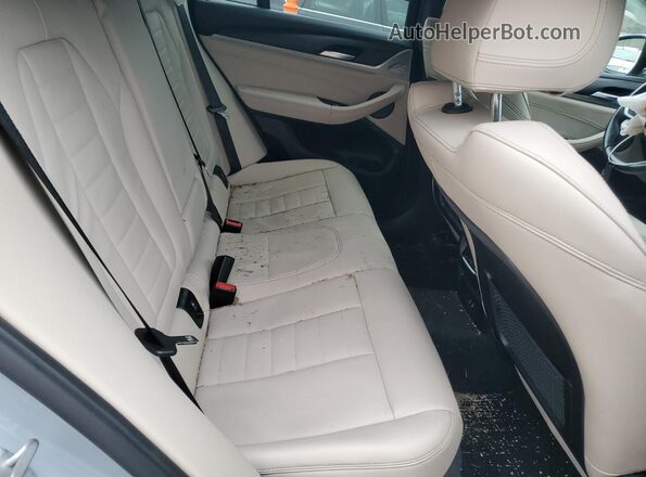 5UX33DT00P9S79753 2023 BMW X4 Синий Вид задней части салона