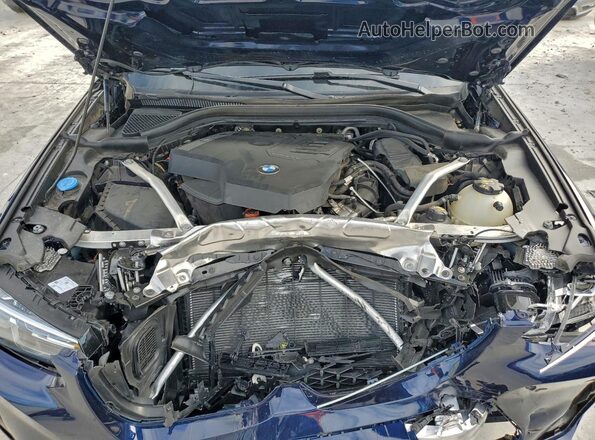 5UX33DT08N9L26010 2022 BMW X4 Синий Вид задней части салона