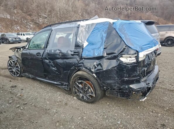 5UX33EM09T9018975 2026 BMW X7 Черный Задняя левая четверть