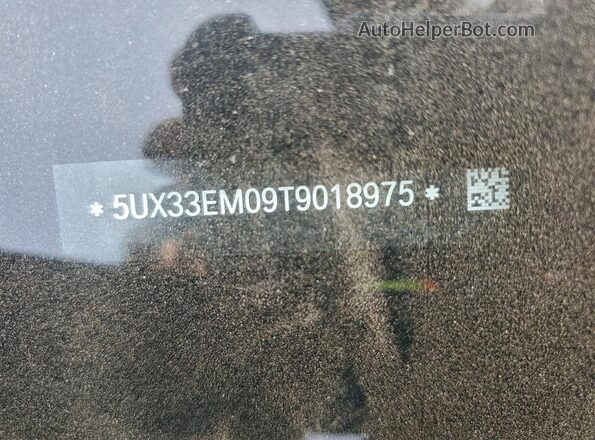 5UX33EM09T9018975 2026 BMW X7 Черный Вид наклейки с VIN-кодом