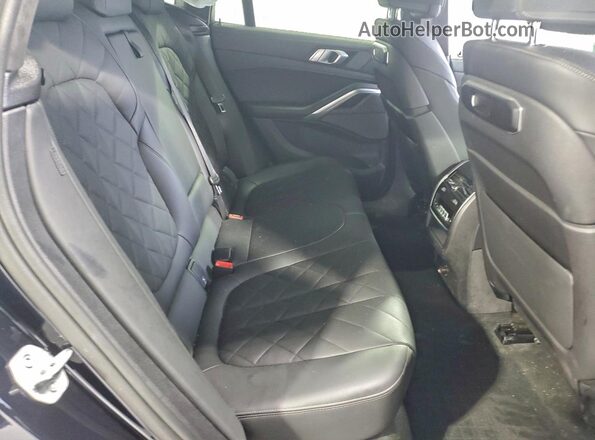 5UX33EX07R9T44164 2024 BMW X6 White Вид задньої частини салону